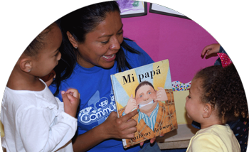 preschool teacher reading book in spanish